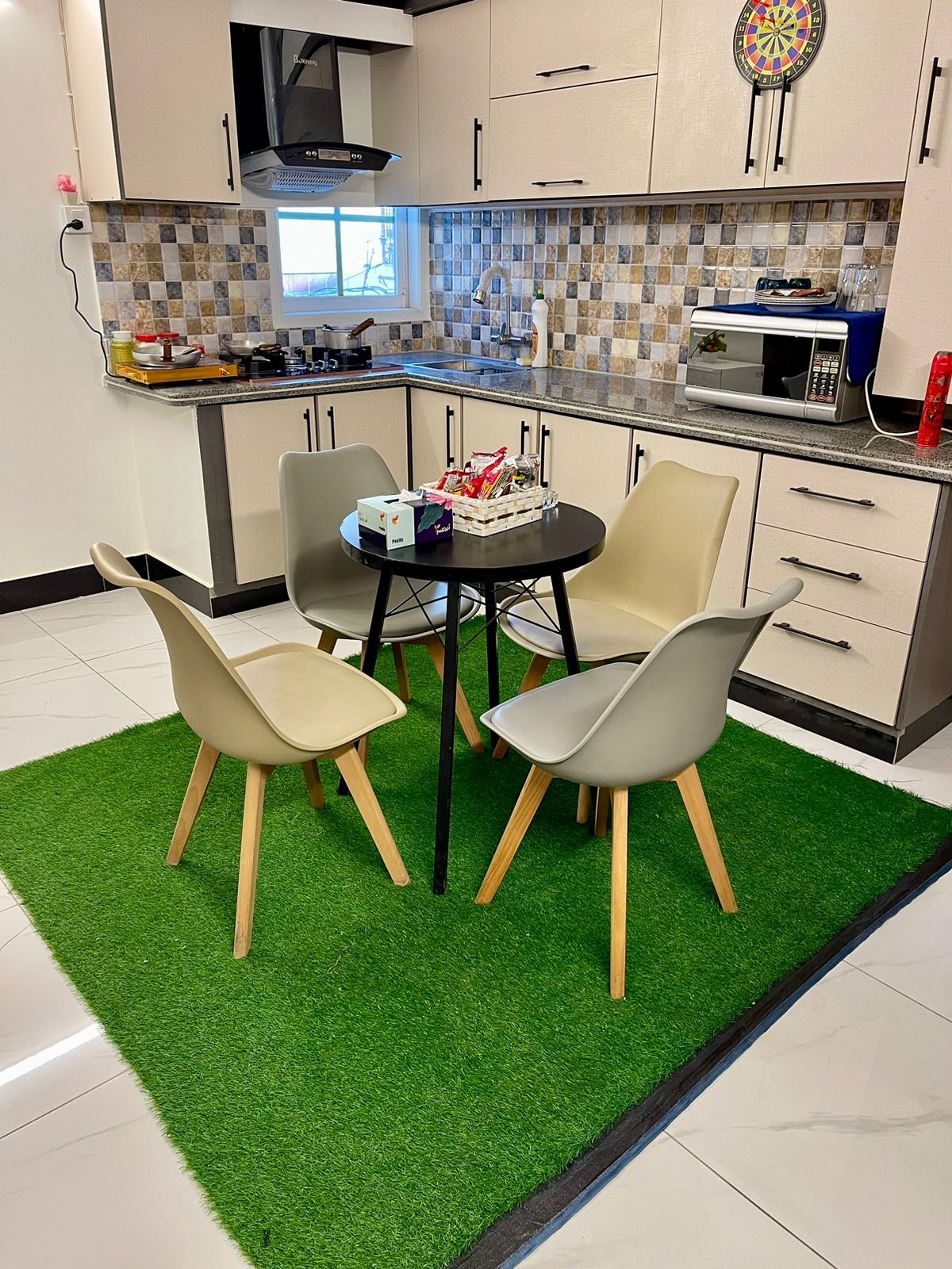 Cool & Cozy 1-Bedroom Apt DHA | Lounge & Kitchen - Dining area image 1