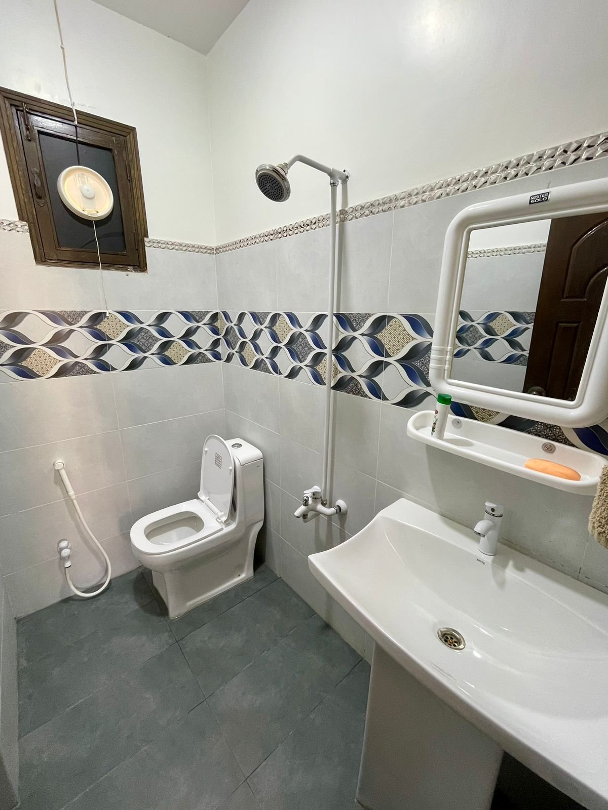 Cool & Cozy 1-Bedroom Apt DHA | Lounge & Kitchen - Full bathroom image 1