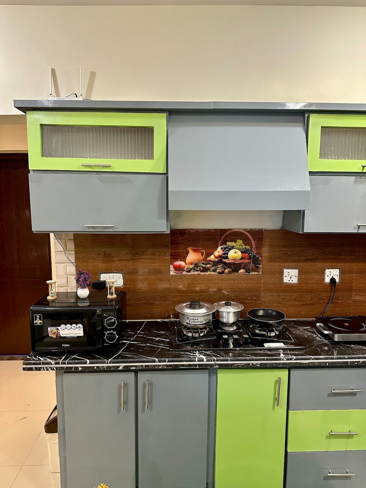 Designer 2BR Apartment in DHA With TV & AC - Full kitchen image 1