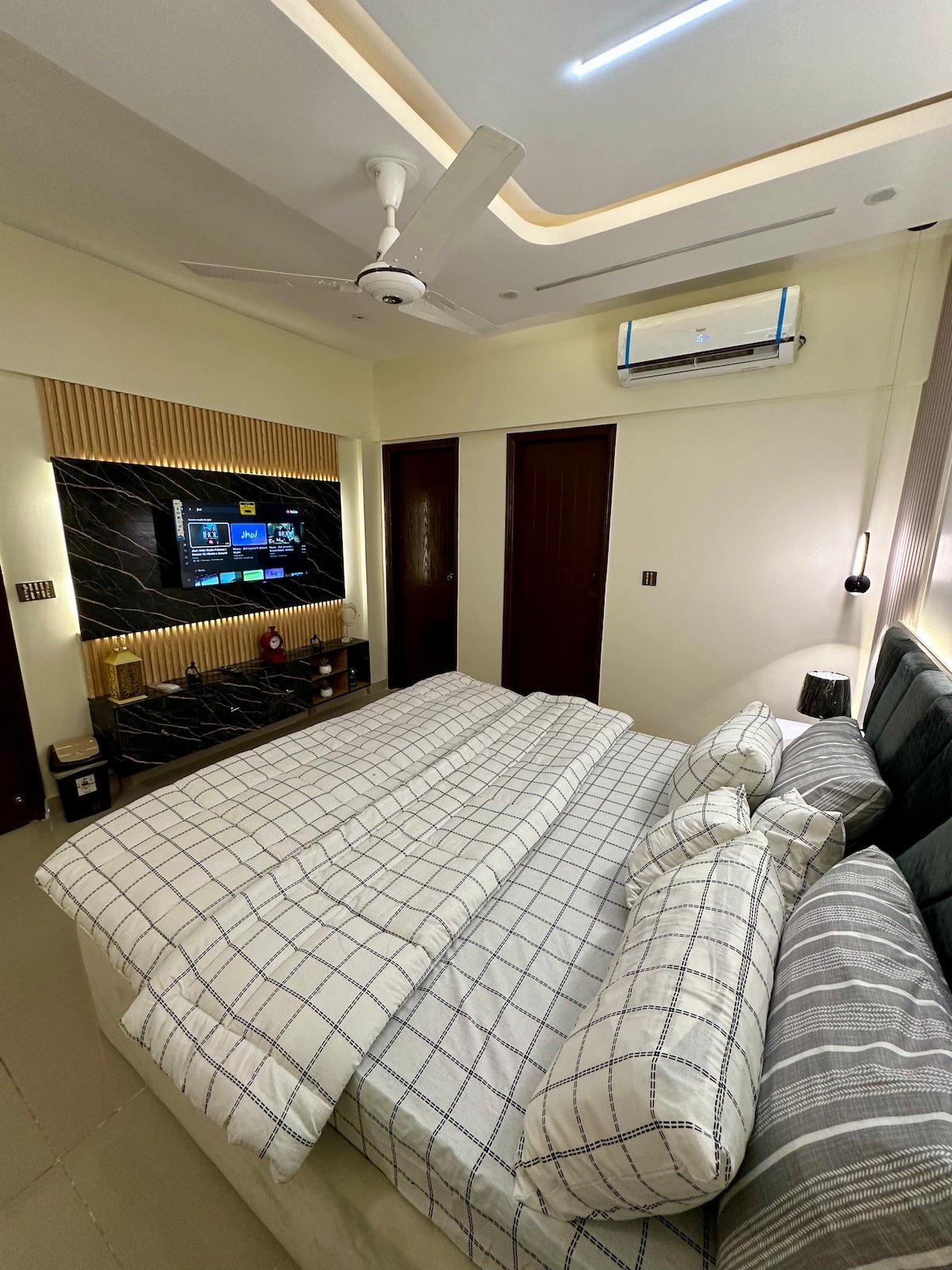 Designer 2BR Apartment in DHA With TV & AC - Bedroom 1 image 3