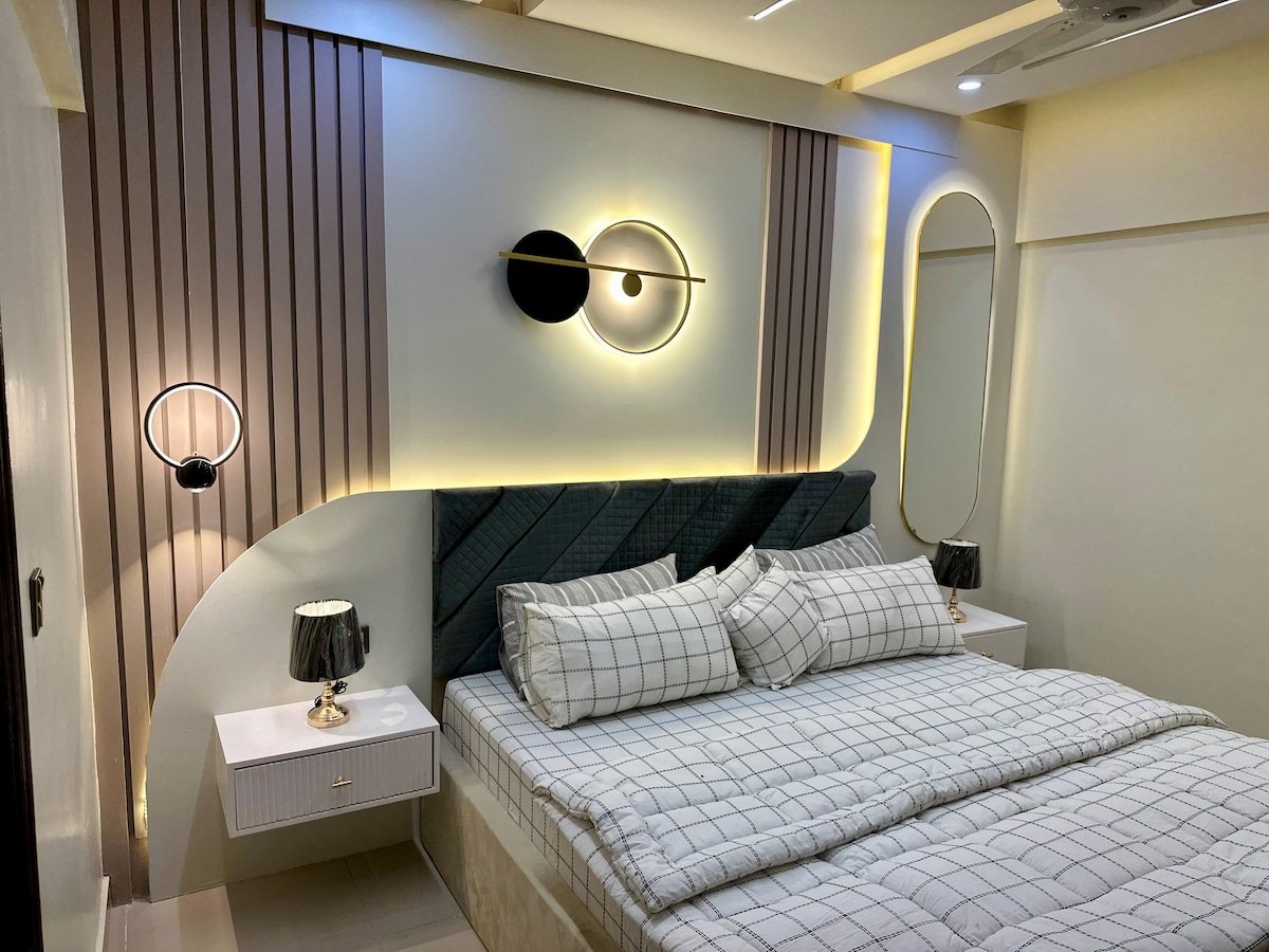 Designer 2BR Apartment in DHA With TV & AC - Bedroom 1 image 7