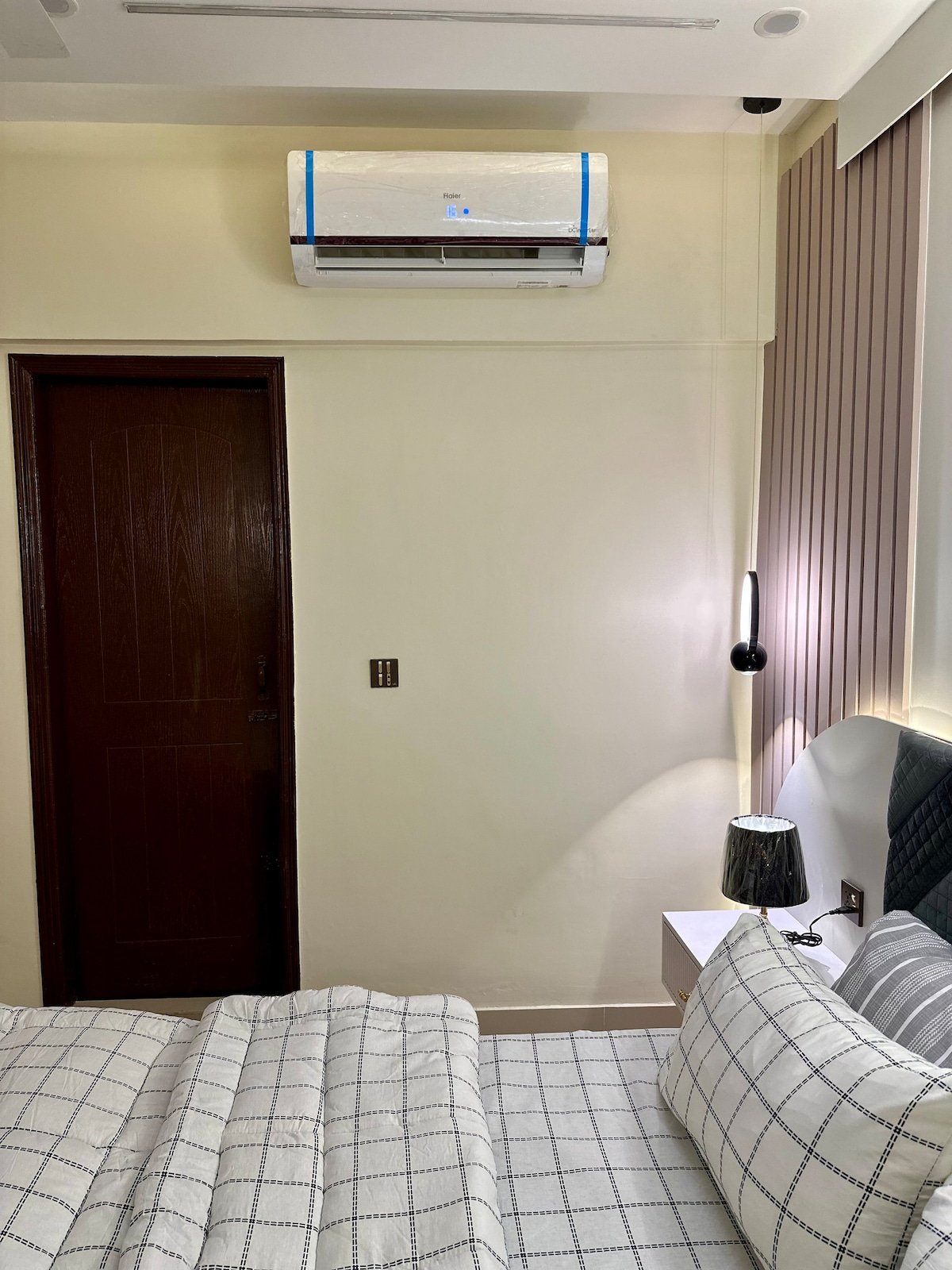 Designer 2BR Apartment in DHA With TV & AC - Bedroom 1 image 14
