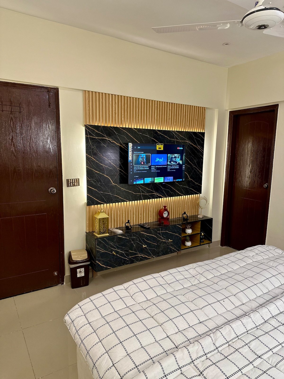 Designer 2BR Apartment in DHA With TV & AC - Bedroom 1 image 15