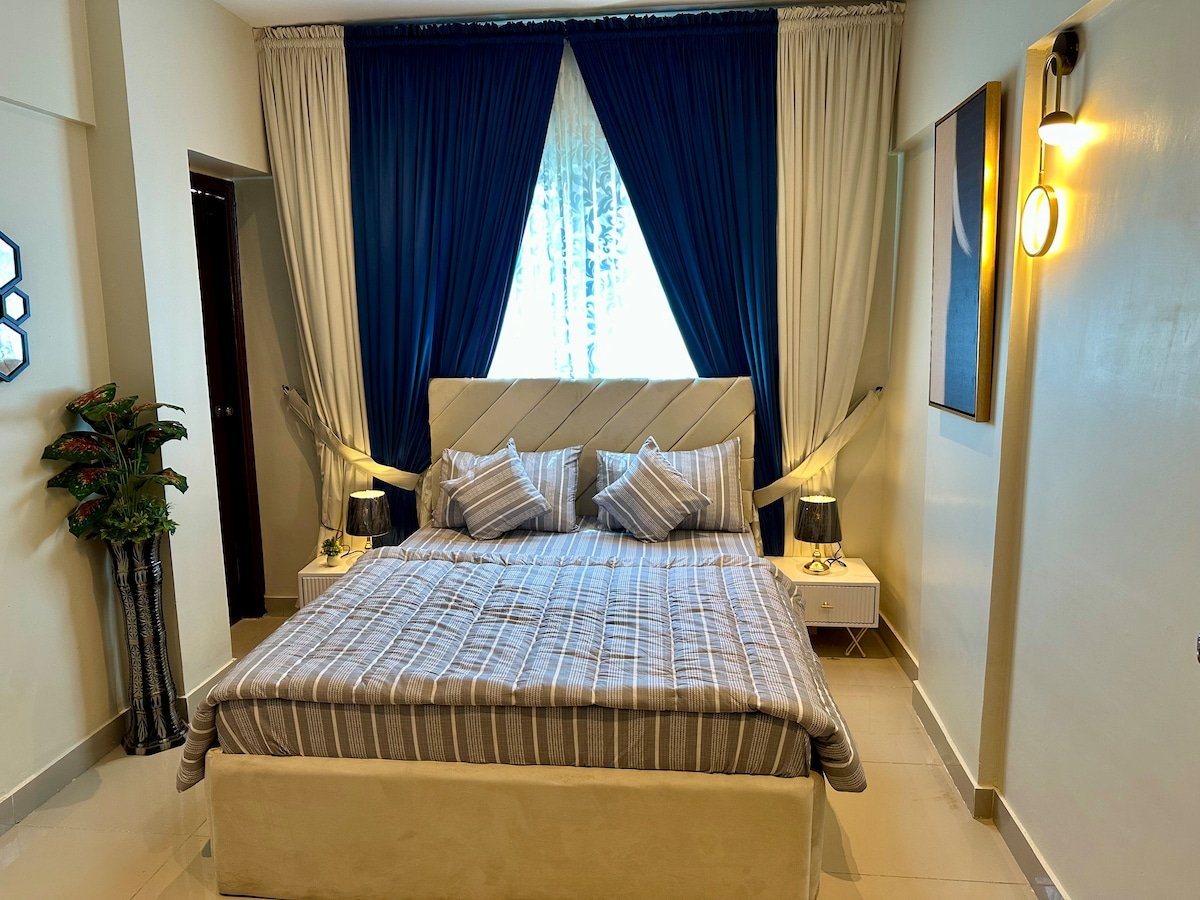 Designer 2BR Apartment in DHA With TV & AC - Bedroom 2 image 1