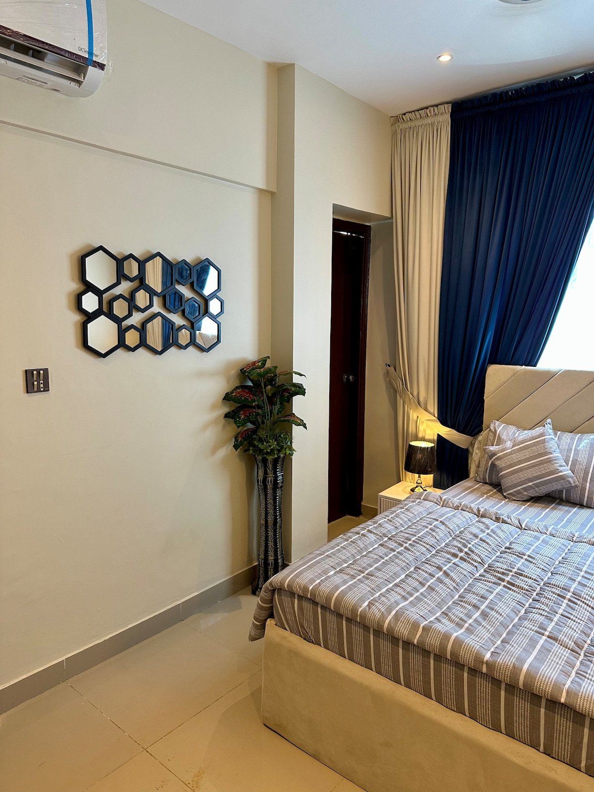 Designer 2BR Apartment in DHA With TV & AC - Bedroom 2 image 3