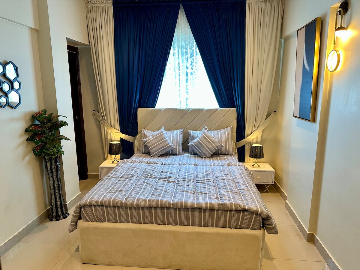 Designer 2BR Apartment in DHA With TV & AC - Bedroom 2 image 7
