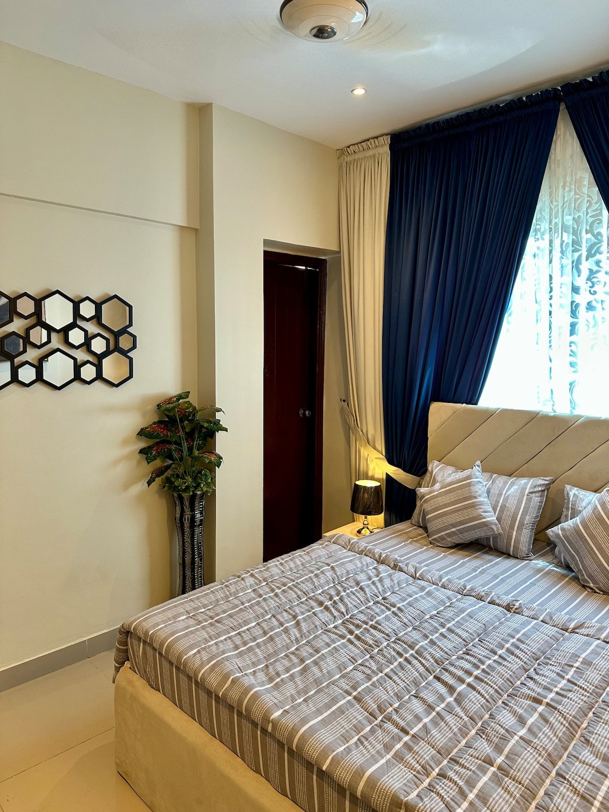 Designer 2BR Apartment in DHA With TV & AC - Bedroom 2 image 8